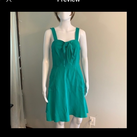 a new day Dresses & Skirts - A New Day sleeveless dress NWT pockets Tie top S